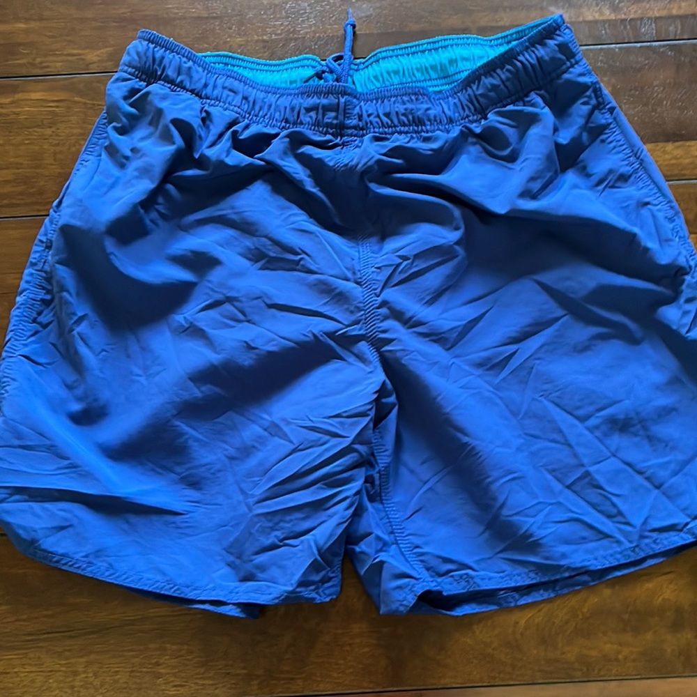 Islander mens swim trunks with pockets. Size large
